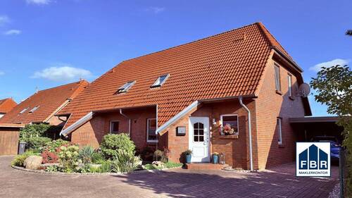 Fassadenansicht des Doppelhauses - 4 Zimmer Doppelhaushälfte zum Kaufen in Plate