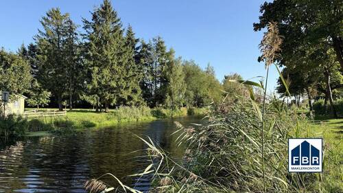 Blick auf die Stör innerorts - Doppelhaushälfte mit 95,90 m&sup2; in Plate zum Kaufen