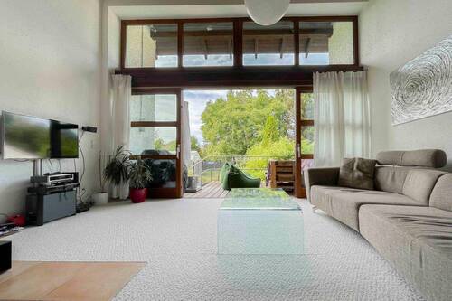 Wohnzimmer - Doppelhaushälfte mit 256,00 m² in München zum Kaufen