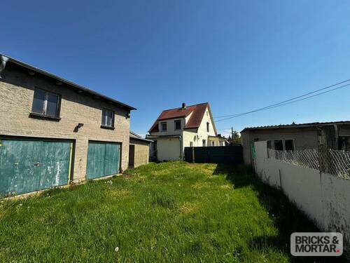 Rückansicht mit Nebengelass - 5 Zimmer Einfamilienhaus zum Kaufen in Delitzsch / Laue
