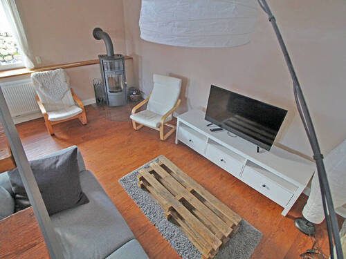 Sitzbereich mit Kaminofen - 