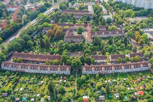 Dammwegsiedlung - Bezugsfreie charmante 2,5-Zimmer-Wohnung mit Gartenidyll in der denkmalgeschützten Dammwegsiedlung
