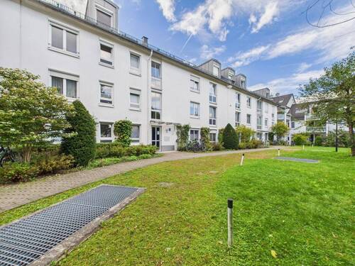 Ruhiger Innenhof - 4. Charmante 2 Zi. Wohnung mit Wohlfühlambiente. Südbalkon, Einbauküche und TG