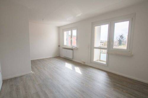 Wohnzimmer - 3-Zimmerwohnung mit Balkon an der Heide.