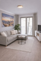 Wohnbereich - Modernes City-Apartment mit Balkon, Aufzug & TG-Stellplatz in ruhiger Lage nahe Hauptbahnhof