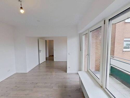 Ansicht III: Wohn- und Esszimmer - 4 Zimmer Etagenwohnung in Isselburg
