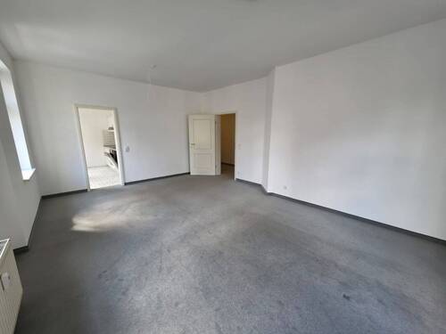 Wohnbereich mit Zugang zur Küche - 