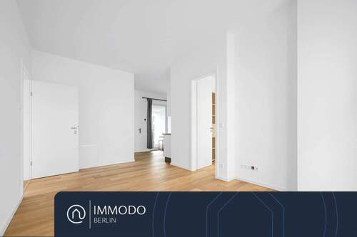 Offener Wohnbereich mit Sichtachse zur Küche - ?? Stilvolle 2-Zi-Neubauwohnung in Mitte mit Loggia, 14 m² Dachterrasse & hochwertiger Ausstattung