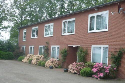 Hausansicht - 4 Zimmer Terrassenwohnung zur Miete in Bienenbüttel-Rieste