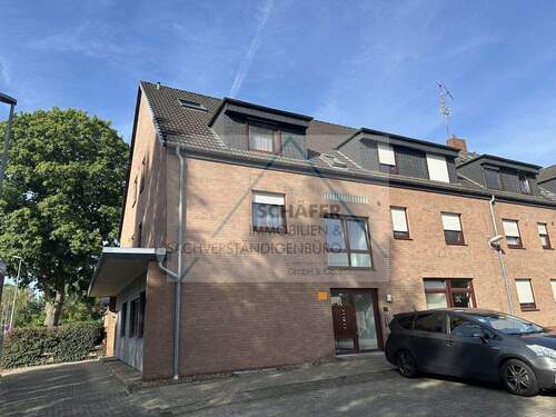 Außenansicht - Dachgeschosswohnung in Syke zu verkaufen (plus ausgebauten Spitzboden)