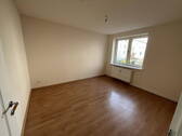 Schlafzimmer - Gemütliche 1,5-Zimmer-Erdgeschosswohnung mit Wohnküche - sofort bezugsfrei