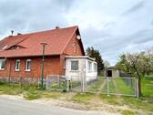 Straßenansicht 2 - Doppelhaushälfte mit 90,00 m² in Pritzwalk zum Kaufen
