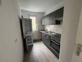 Küche mit Einbauküche - Und die Küche ist schon dabei...schöne 2-Zimmer-Wohnung mit Einbauküche, sofort einzugsfertig