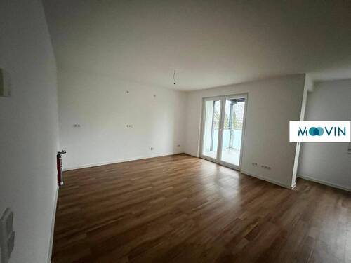 Ansicht III: Wohn- und Esszimmer mit offenem Küchenbereich - 