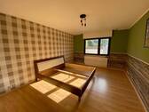 Schlafzimmer im Erdgeschoss - 