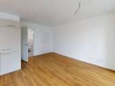 Ansicht III: Wohnzimmer mit offenem Küchenbereich - 2 Zimmer Etagenwohnung in Nürnberg