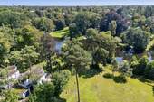 Bild 1 - Sanierungsbedürftige Ikone der 70er-Architektur in Südlage - unverbaubarer Wasserblick