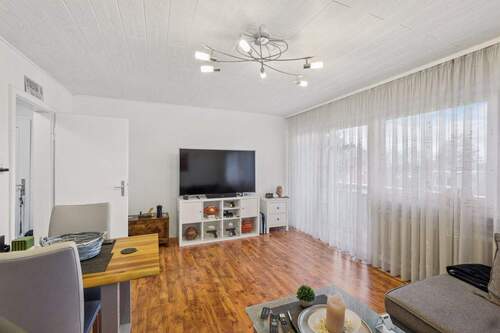 Wohnzimmer - 2-Zimmer-Wohnung mit zusätzlicher Fläche im Dachbereich