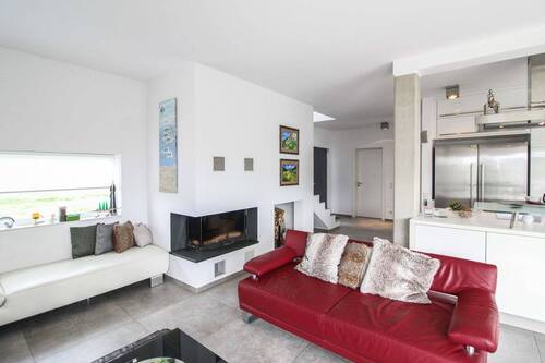 Wohnbereich mit Kamin - 3 Zimmer Einfamilienhaus in Staudt