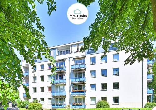 Bild 1 - Ruhige Wohnstraße, beste Anbindung. Blick in die Baumkronen.