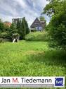 Grundstück mit Haus - 