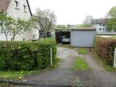 Zufahrt zur Garage + Carport - 