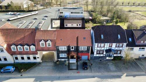 Luftbild - Zwei Wohnhäuser mit vielseitigen Nutzungsmöglichkeiten in 37431 Bad Lauterberg OT Bartolfelde