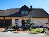 Außenansicht - Solides Einfamilienhaus mit Einliegerwohnung