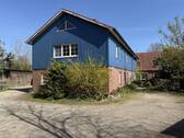 Viehstall wohnlich ausgebaut - 1 Zimmer Mehrfamilienhaus, Wohnhaus in Hamweddel