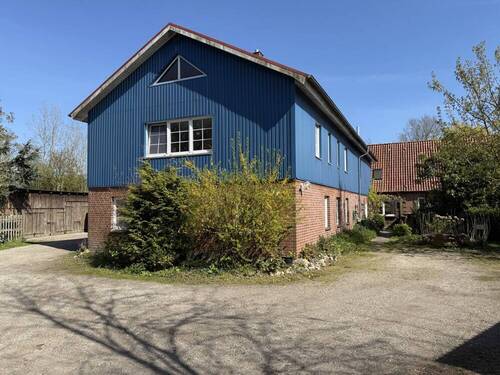 Viehstall wohnlich ausgebaut - 1 Zimmer Mehrfamilienhaus, Wohnhaus in Hamweddel
