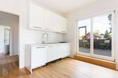 Küche Wohnung 3 mit Zugang zur Ost-Terrasse - 