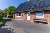 Wohneinheit 1 - Eingang - 9 Zimmer Mehrfamilienhaus, Wohnhaus in Welmbüttel