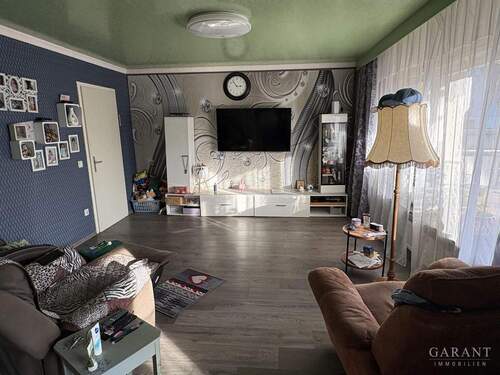 Wohnzimmer EG - Mehrfamilienhaus, Wohnhaus mit 239,00 m&sup2; in Schwäbisch Gmünd zum Kaufen