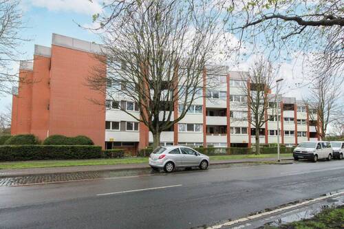 Außenansicht - Flexibel nutzbar: 3-Zimmer-Wohnung mit Loggia, TG-Stellplatz & Entwicklungspotenzial im Heideviertel