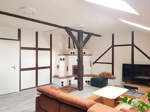 Wohnzimmer mit Kamin - 4 Zimmer Etagenwohnung in Porta Westfalica