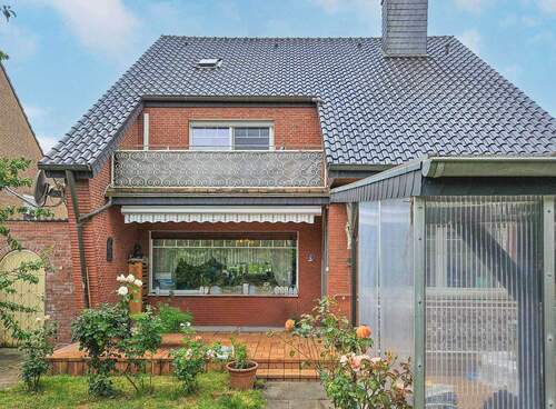 Rückansicht - Mehrfamilienhaus, Wohnhaus mit 113,00 m&sup2; in Übach-Palenberg zum Kaufen