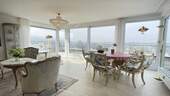 Wohnzimmer mit Panoramablick - Penthouse-Dachgeschoss mit sensationeller See- und Bergsicht