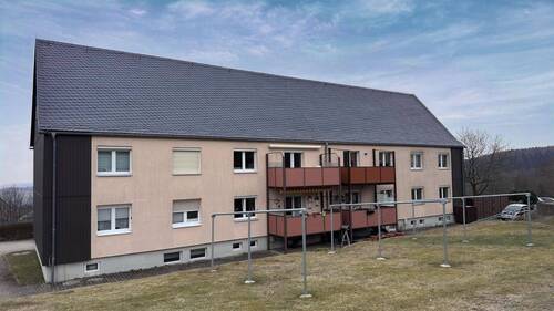 Hinteransicht Gebäude - Etagenwohnung mit 63,30 m&sup2; in Altenberg zum Kaufen