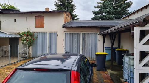 Ansicht Garage und Schuppen - 