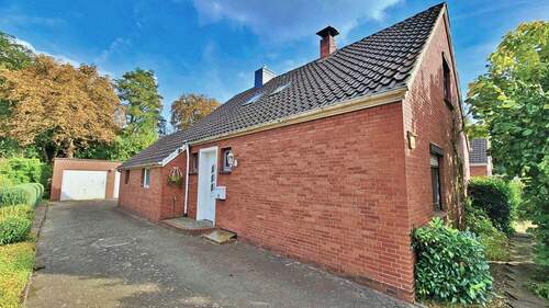 Außenansicht Eingang - Einfamilienhaus mit 151,00 m² in Delmenhorst zum Kaufen