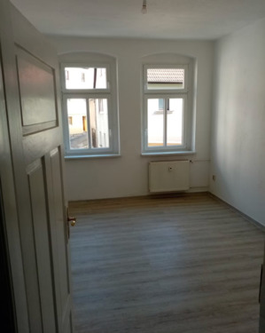 Wohnzimmer - 1 Zimmer Mehrfamilienhaus, Wohnhaus zum Kaufen in Eisenberg