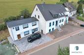 Außenansicht - Modernisiertes Zweifamilienhaus über 272 qm & 6 Stellplätzen - Mehrgenerationentraum in Hoppstädten
