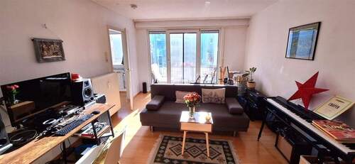 Wohnzimmer - Etagenwohnung mit 63,00 m&sup2; in Mannheim zum Kaufen