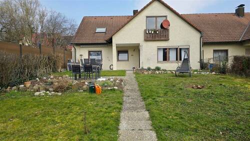 Ansicht - Großzügiges Reihenendhaus mit Einliegerwohnung, Garten und Garage in ruhiger Lage von Kützberg