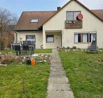 Großzügiges Reihenendhaus mit Einliegerwohnung, Garten und Garage in ruhiger Lage von Kützberg - Poppenhausen