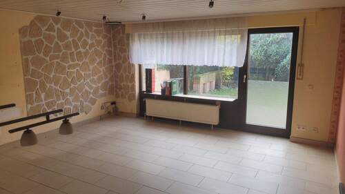 Wohnzimmer - Reihenendhaus mit 117,00 m&sup2; in Düsseldorf zum Kaufen