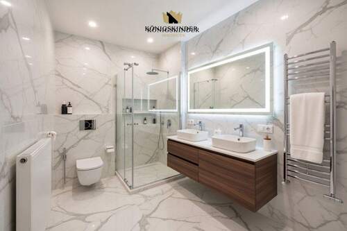 Die Abbildung zeigt eine mögliche Gestaltung des Badezimmers als Visualisierung. - 