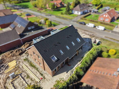 Außenansicht - Mehrfamilienhaus, Wohnhaus mit 302,00 m&sup2; in Ostrhauderfehn zum Kaufen