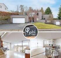 PHI AACHEN - Repräsentative Splitlevel-Wohlfühloase mit Garagen in gefragter Lage von Roetgen!