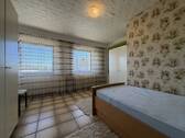 Zimmer im Untergeschoss - 